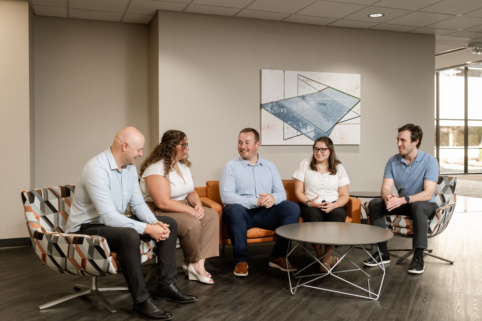 Meriwether WDM July 2026 Meriwether employees talking in the lobby