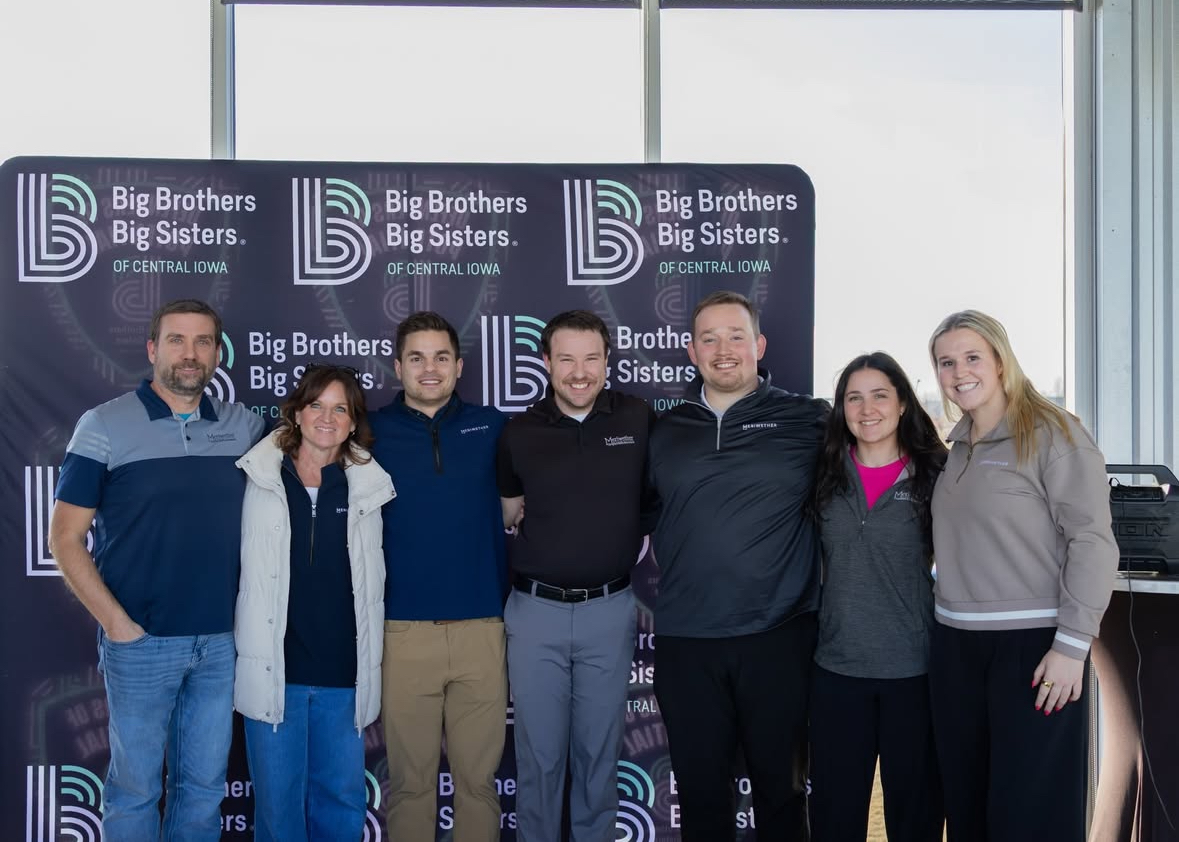 WDM- Big Brothers Big Sisters Top Golf 2_2026 Meriwether employees at a Big Brothers Big Sisters charity event